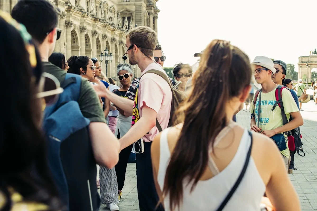 Destination guide explaining a landmark to a visitor group