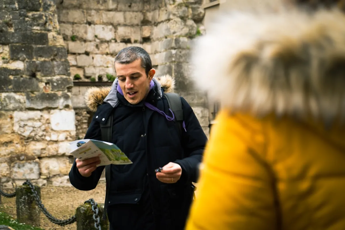 Heritage guide interpreting a historic site for visitors
